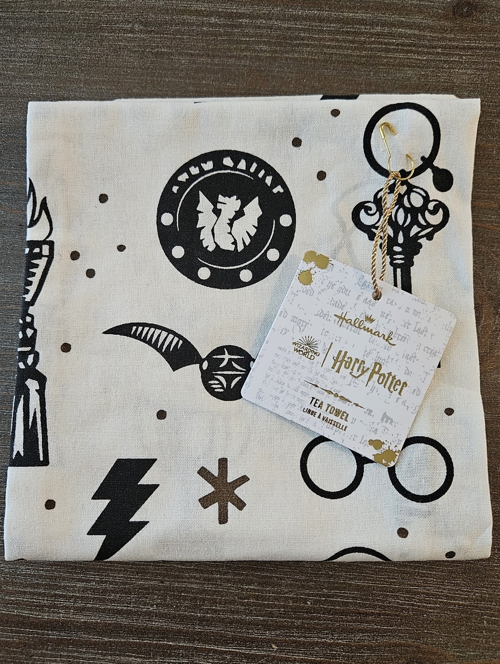 Hallmark Harry Potter Print Tea Towel in Black & Gold